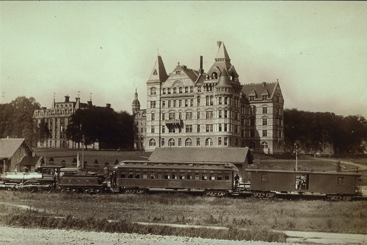 View from southwest, with Pennsylvania Railroad station in foreground (photo circa 1878)