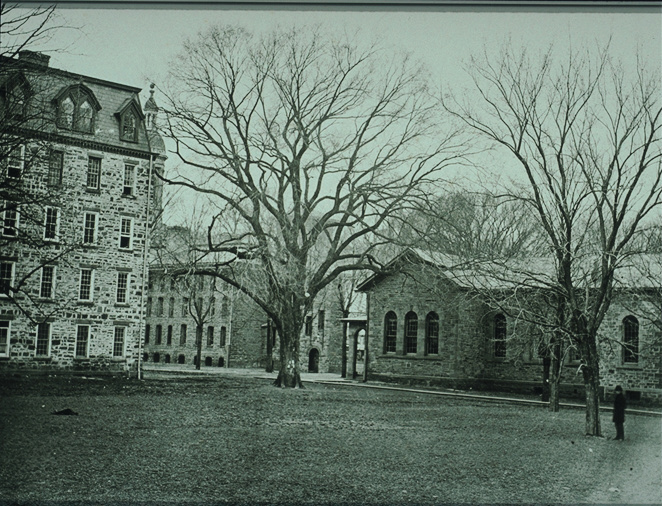 View from southeast, with Bulletin Elm and East College at left (1870's photo)