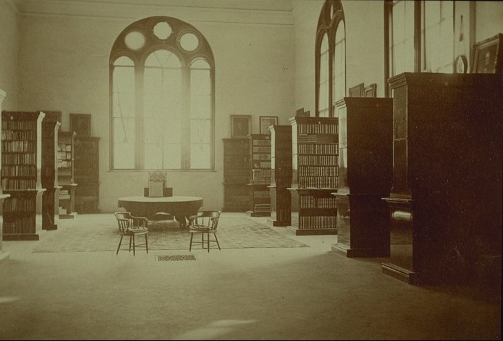 Interior, library in south wing, looking toward window (photo circa 1868)