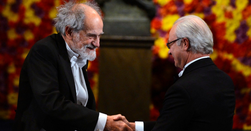 Receiving the Nobel Prize from Sweden's King Carl XVI Gustaf